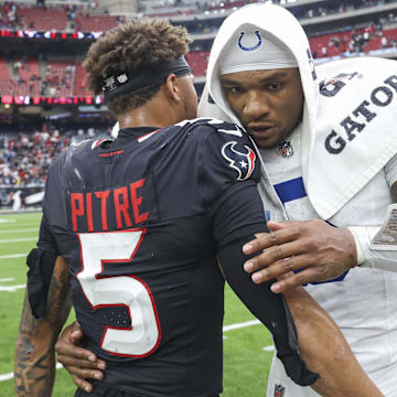 Oct 27, 2024; Houston, Texas, USA; Indianapolis Colts quarterback Anthony Richardson (5) greets Houston Texans safety Jalen Pitre (5) on the field after the game at NRG Stadium. Mandatory Credit: Troy Taormina-Imagn Images