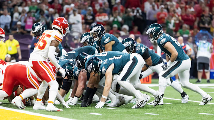 Feb 9, 2025; New Orleans, LA, USA; Philadelphia Eagles  quarterback Jalen Hurts (1) lines up for the tush push play on the goal line against the Kansas City Chiefs during Super Bowl LIX at Ceasars Superdome. Mandatory Credit: Mark J. Rebilas-Imagn Images