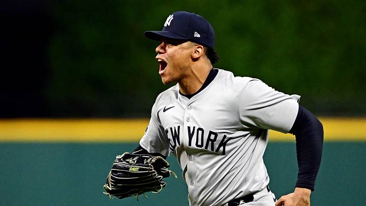 Oct 19, 2024; Cleveland, Ohio, USA; New York Yankees outfielder Juan Soto (22) celebrates after making the final out to beat the Cleveland Guardians during game five of the ALCS for the 2024 MLB playoffs at Progressive Field. Mandatory Credit: David Dermer-Imagn Images