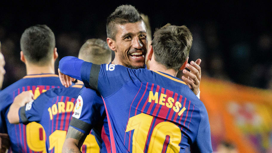 Paulinho and Lionel Messi for Barcelona.