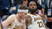 Los Angeles Lakers star LeBron James reacts to a replay that confirms he fouled Minnesota Timberwolves' Anthony Edwards.