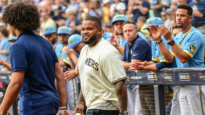 Aug 6, 2022; Milwaukee, Wisconsin, USA; Former Milwaukee Brewers Prince Fielder is greeted after joining the Brewer Walk of Fame before game against the Cincinnati Reds at American Family Field. Mandatory Credit: Benny Sieu-USA TODAY Sports