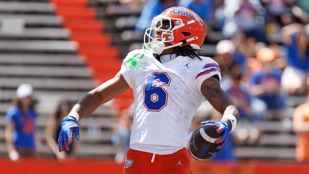 Apr 12, 2025; Gainesville, FL, USA; Florida Gators wide receiver Dallas Wilson (6) reacts after scoring a touchdown during the second half at Ben Hill Griffin Stadium. 