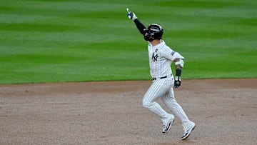 Oct 29, 2024; New York, New York, USA; New York Yankees second baseman Gleyber Torres (25) celebrates after hitting a three-run home run during the eighth inning against the Los Angeles Dodgers in game four of the 2024 MLB World Series at Yankee Stadium. Mandatory Credit: John Jones-Imagn Images