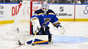 Feb 23, 2025; St. Louis, Missouri, USA;  St. Louis Blues goaltender Jordan Binnington (50) defends the net against the Colorado Avalanche during the third period at Enterprise Center. Mandatory Credit: Jeff Curry-Imagn Images