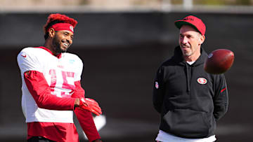 San Francisco 49ers wide receiver Jauan Jennings (L) and head coach Kyle Shanahan (R)