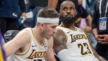 Los Angeles Lakers forward LeBron James (23) reacts to a replay during the first round of the 2025 NBA Playoffs at Target Center. 
