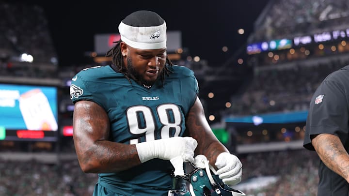 Eagles defensive tackle Jalen Carter walks off the field after being ejected during the first quarter after spitting on Cowboys quarterback Dak Prescott. Eagles defensive tackle Jalen Carter walks off the field after being ejected during the first quarter after spitting on Cowboys quarterback Dak Prescott.