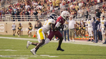 No. 7 sophomore Lawayne McCoy runs a play in the Kent State game on Sept. 20.