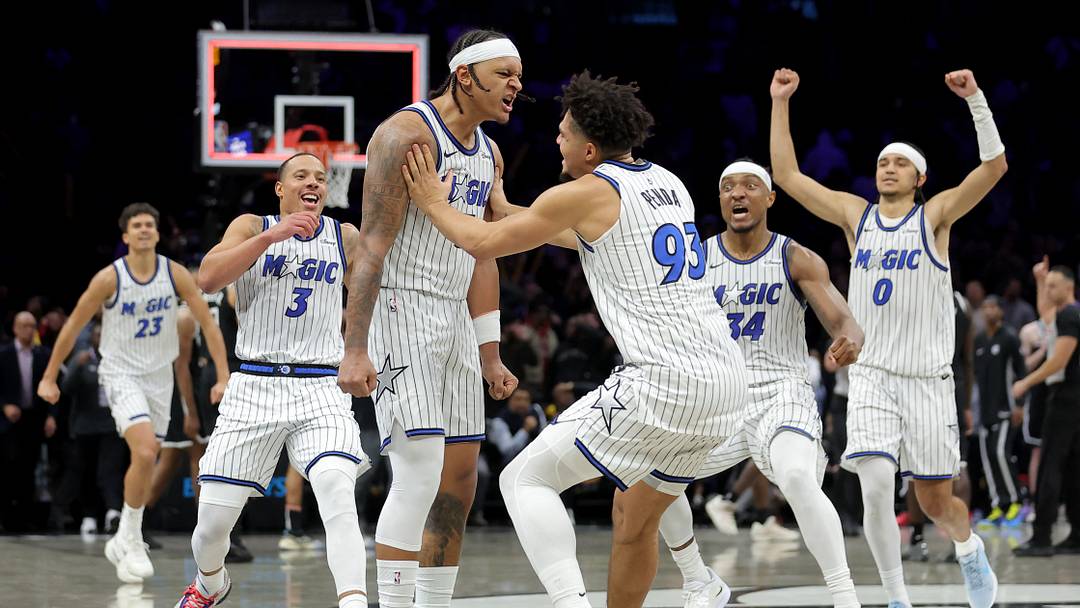 Jan 7, 2026; Brooklyn, New York, USA; Orlando Magic forward Paolo Banchero (5) celebrates his overtime game-winning three point shot against the Brooklyn Nets with guard Desmond Bane (3) and forward Noah Penda (93) and center Wendell Carter Jr. (34) and guard Anthony Black (0) at Barclays Center. Mandatory Credit: Brad Penner-Imagn Images Jan 7, 2026; Brooklyn, New York, USA; Orlando Magic forward Paolo Banchero (5) celebrates his overtime game-winning three point shot against the Brooklyn Nets with guard Desmond Bane (3) and forward Noah Penda (93) and center Wendell Carter Jr. (34) and guard Anthony Black (0) at Barclays Center. Mandatory Credit: Brad Penner-Imagn Images
