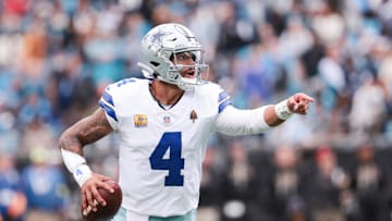 Oct 12, 2025; Charlotte, North Carolina, USA; Dallas Cowboys quarterback Dak Prescott (4) communicates during the second half against the Carolina Panthers at Bank of America Stadium. Mandatory Credit: Scott Kinser-Imagn Images
