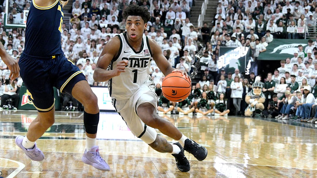 Jan 30, 2026; East Lansing, Michigan, USA; Michigan State Spartans guard Jeremy Fears Jr. (1) dribbles past Michigan Wolverines guard Roddy Gayle Jr. (11). Jan 30, 2026; East Lansing, Michigan, USA; Michigan State Spartans guard Jeremy Fears Jr. (1) dribbles past Michigan Wolverines guard Roddy Gayle Jr. (11).