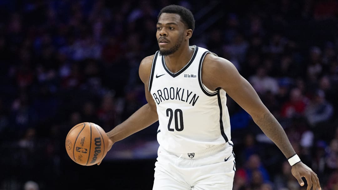 Dec 23, 2025; Philadelphia, Pennsylvania, USA; Brooklyn Nets center Day'Ron Sharpe (20) controls the ball against the Philadelphia 76ers during the first quarter at Xfinity Mobile Arena. Mandatory Credit: Bill Streicher-Imagn Images