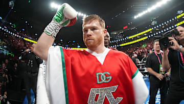 Sep 17, 2022; Las Vegas, Nevada, USA; Canelo Alvarez (red trunks) and Gennadiy Golovkin (white trunks) box during a middleweight championship bout at T-Mobile Arena. Mandatory Credit: Joe Camporeale-Imagn Images