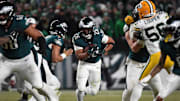 Philadelphia Eagles running back Saquon Barkley rushes the ball against the Green Bay Packers in an NFC wild card game