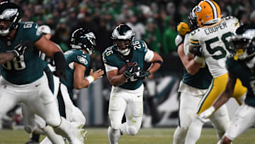 Philadelphia Eagles running back Saquon Barkley rushes the ball against the Green Bay Packers in an NFC wild card game