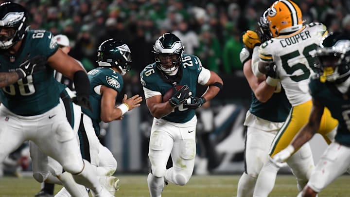 Philadelphia Eagles running back Saquon Barkley rushes the ball against the Green Bay Packers in an NFC wild card game Philadelphia Eagles running back Saquon Barkley rushes the ball against the Green Bay Packers in an NFC wild card game