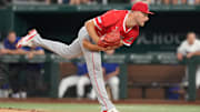 Aug 25, 2025; Arlington, Texas, USA; Los Angeles Angels relief pitcher Reid Detmers (48) delivers a pitch to the Texas Rangers during the seventh inning at Globe Life Field. Mandatory Credit: Jim Cowsert-Imagn Images