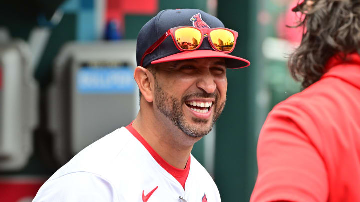 Jun 9, 2024; St. Louis, Missouri, USA; St. Louis Cardinals manager Oliver Marmol (37) shares a laugh in the dugout before the game against the Colorado Rockies at Busch Stadium. Mandatory Credit: Tim Vizer-USA TODAY Sports