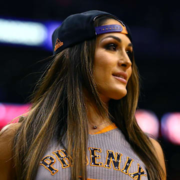 Mar 11, 2015; Phoenix, AZ, USA; WWE wrestler Nikki Bella in attendance of the game between the Minnesota Timberwolves against the Phoenix Suns at US Airways Center. Mandatory Credit: Mark J. Rebilas-Imagn Images