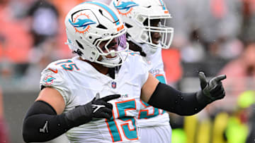 Oct 19, 2025; Cleveland, Ohio, USA; Miami Dolphins linebacker Jaelan Phillips (15) celebrates after a tackle during the first half against the Cleveland Browns at Huntington Bank Field. Mandatory Credit: Ken Blaze-Imagn Images