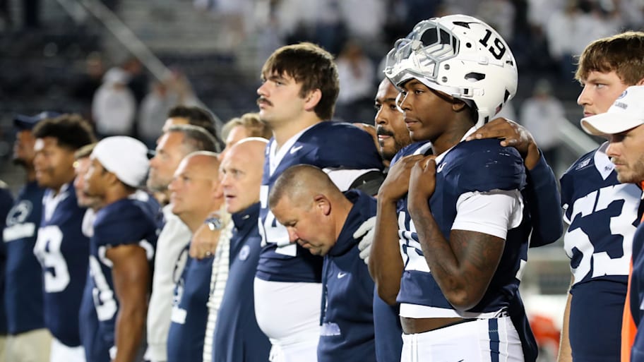 Penn State Nittany Lion players sing their alma mater