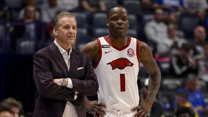 Calipari talks with Davis during the game. Calipari talks with Davis during the game.