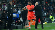 Mike Maignan se plaignant des injures racistes contre l'Udinese