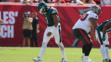 Sep 29, 2024; Tampa, Florida, USA; Philadelphia Eagles quarterback Jalen Hurts (1) looks down as he walks off the field against the Tampa Bay Buccaneers during the second half at Raymond James Stadium. Mandatory Credit: Kim Klement Neitzel-Imagn Images