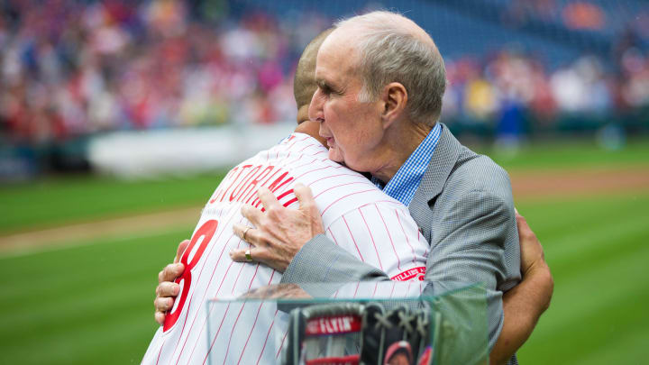 Aug 3, 2018; Philadelphia, PA, USA; Philadelphia Phillies chairman David Montgomery hugs former player Shane Victorino.