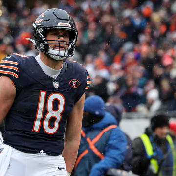 Dec 31, 2023; Chicago, Illinois, USA; Chicago Bears tight end Robert Tonyan (18) reacts after a catch against the Atlanta Falcons during the first half at Soldier Field.