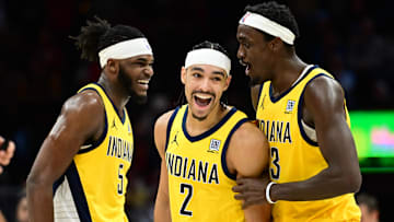 Jan 12, 2025; Cleveland, Ohio, USA; Indiana Pacers guard Andrew Nembhard (2) celebrates with forward Jarace Walker (5) and forward Pascal Siakam (43) after a basket during the second half against the Cleveland Cavaliers at Rocket Mortgage FieldHouse. Mandatory Credit: Ken Blaze-Imagn Images