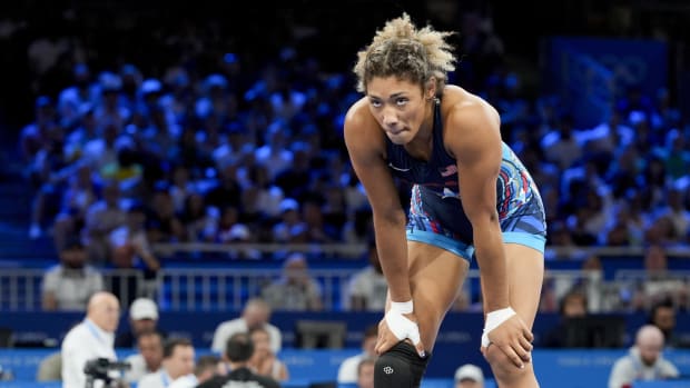 American wrestler Kennedy Blades stares down the competition during a match at the Paris Olympics.