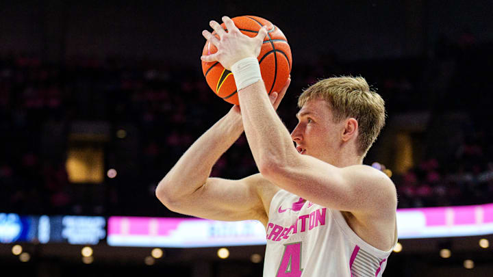 Creighton Bluejays guard Josh Dix (4) shoots the ball against the Connecticut Huskies during the second half at CHI Health Center Omaha. 
