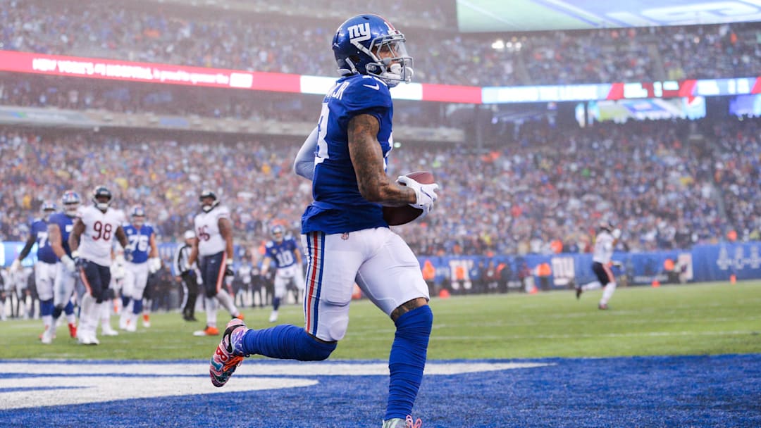 Dec 2, 2018; East Rutherford, NJ, USA; New York Giants wide receiver Odell Beckham Jr. (13) scores a touchdown against the Chicago Bears during the third quarter at MetLife Stadium. Mandatory Credit: Brad Penner-Imagn Images