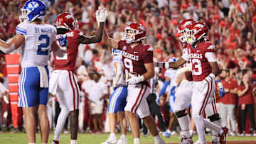 Sep 16, 2023; Fayetteville, Arkansas, USA; Arkansas Razorbacks tight end Luke Hasz (9) celebrates with wide receiver Andrew Armstrong (2) after scoring a touchdown in the second quarter against the BYU Cougars at Donald W. Reynolds Razorback Stadium. Mandatory Credit: Nelson Chenault-USA TODAY Sports