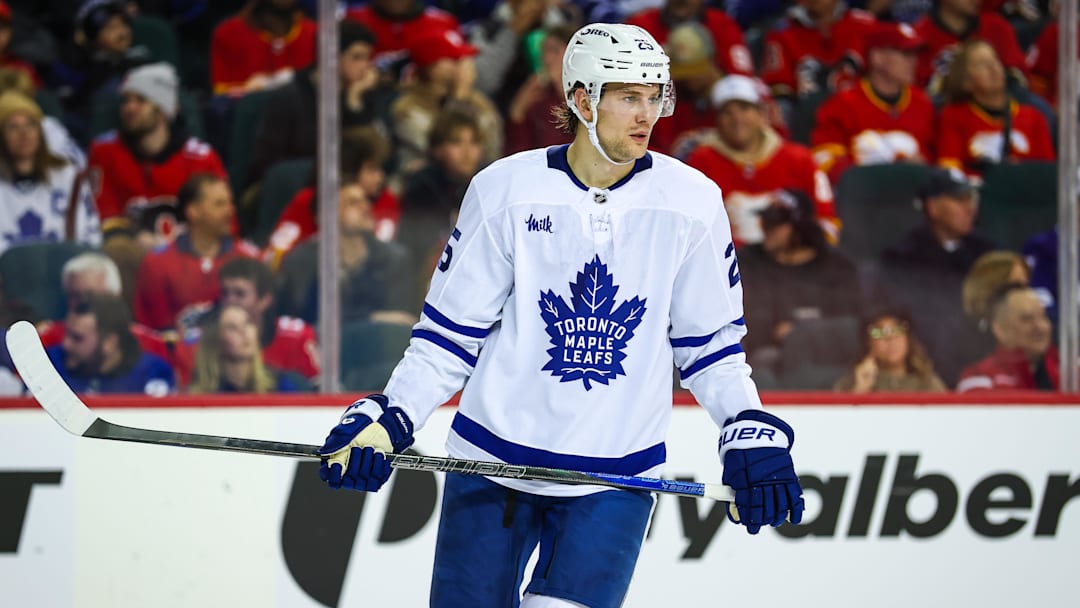 Feb 2, 2026; Calgary, Alberta, CAN; Toronto Maple Leafs defenseman Brandon Carlo (25) against the Calgary Flames during the second period at Scotiabank Saddledome. Mandatory Credit: Sergei Belski-Imagn Images