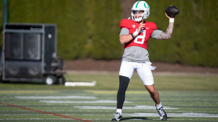 Oregon quarterback Dillon Gabriel throws during practice with the Oregon Ducks Tuesday, April 2, 2024 in Eugene, Ore.