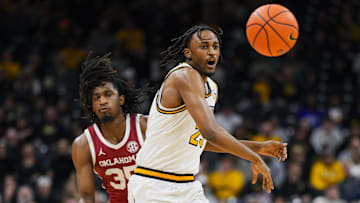 Feb 12, 2025; Columbia, Missouri, USA; Oklahoma Sooners forward Glenn Taylor Jr. (35) knocks the ball away from Missouri Tigers guard Aidan Shaw (23) during the first half at Mizzou Arena. Mandatory Credit: Jay Biggerstaff-Imagn Images