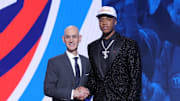 Jun 25, 2025; Brooklyn, NY, USA;  Thomas Sorber stands with NBA commissioner Adam Silver after being selected as the 15th pick by the Oklahoma City Thunder in the first round of the 2025 NBA Draft at Barclays Center. Mandatory Credit: Brad Penner-Imagn Images