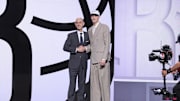 Jun 25, 2025; Brooklyn, NY, USA;  Egor Demin stands with NBA commissioner Adam Silver after being selected as the eighth pick by the Brooklyn Nets in the first round of the 2025 NBA Draft at Barclays Center. Mandatory Credit: Brad Penner-Imagn Images