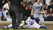 Apr 23, 2025; Chicago, Illinois, USA;  Chicago Cubs first baseman Michael Busch (29) scores against the Los Angeles Dodgers during the fifth inning at Wrigley Field. Mandatory Credit: Matt Marton-Imagn Images