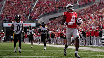 Ohio State Buckeyes wide receiver Jeremiah Smith (4) scores on an 87-yard touchdown catch during the first half of the NCAA football game against Grambling State at Ohio Stadium on Sept. 6, 2025.