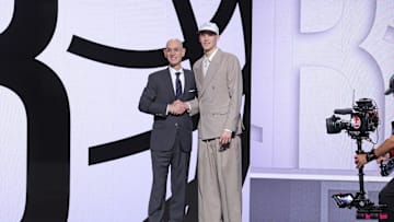 Jun 25, 2025; Brooklyn, NY, USA;  Egor Demin stands with NBA commissioner Adam Silver after being selected as the eighth pick by the Brooklyn Nets in the first round of the 2025 NBA Draft at Barclays Center. Mandatory Credit: Brad Penner-Imagn Images