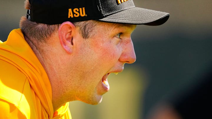 Arizona State head coach Kenny Dillingham yells to his defensive linemen as they run a drill during the first day of fall practice in Tempe, Ariz. on July 30, 2025.