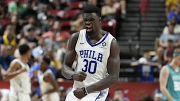 Jul 12, 2025; Las Vegas, NV, USA; Philadelphia 76ers forward/center Adem Bona (30) reacts to a play against the Charlotte Hornets in the third quarter of their game at Thomas & Mack Center. Mandatory Credit: Candice Ward-Imagn Images