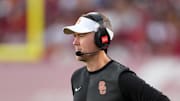 Aug 30, 2025; Los Angeles, California, USA; Southern California Trojans head coach Lincoln Riley watches from the sidelines against the Missouri State Bears in the first half at United Airlines Field at Los Angeles Memorial Coliseum. Mandatory Credit: Kirby Lee-Imagn Images
