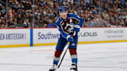 Oct 28, 2025; Denver, Colorado, USA; Colorado Avalanche defenseman Cale Makar (8) passes the puck in the second period against the New Jersey Devils at Ball Arena. Mandatory Credit: Isaiah J. Downing-Imagn Images