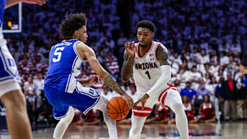 Nov 22, 2024; Tucson, Arizona, USA;  Duke Blue Devils guard Tyrese Proctor (5) steals the ball from Arizona Wildcats guard Caleb Love (1) during the second half at McKale Center. Mandatory Credit: Aryanna Frank-Imagn Images