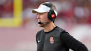 Aug 30, 2025; Los Angeles, California, USA; Southern California Trojans head coach Lincoln Riley watches from the sidelines against the Missouri State Bears in the first half at United Airlines Field at Los Angeles Memorial Coliseum. Mandatory Credit: Kirby Lee-Imagn Images